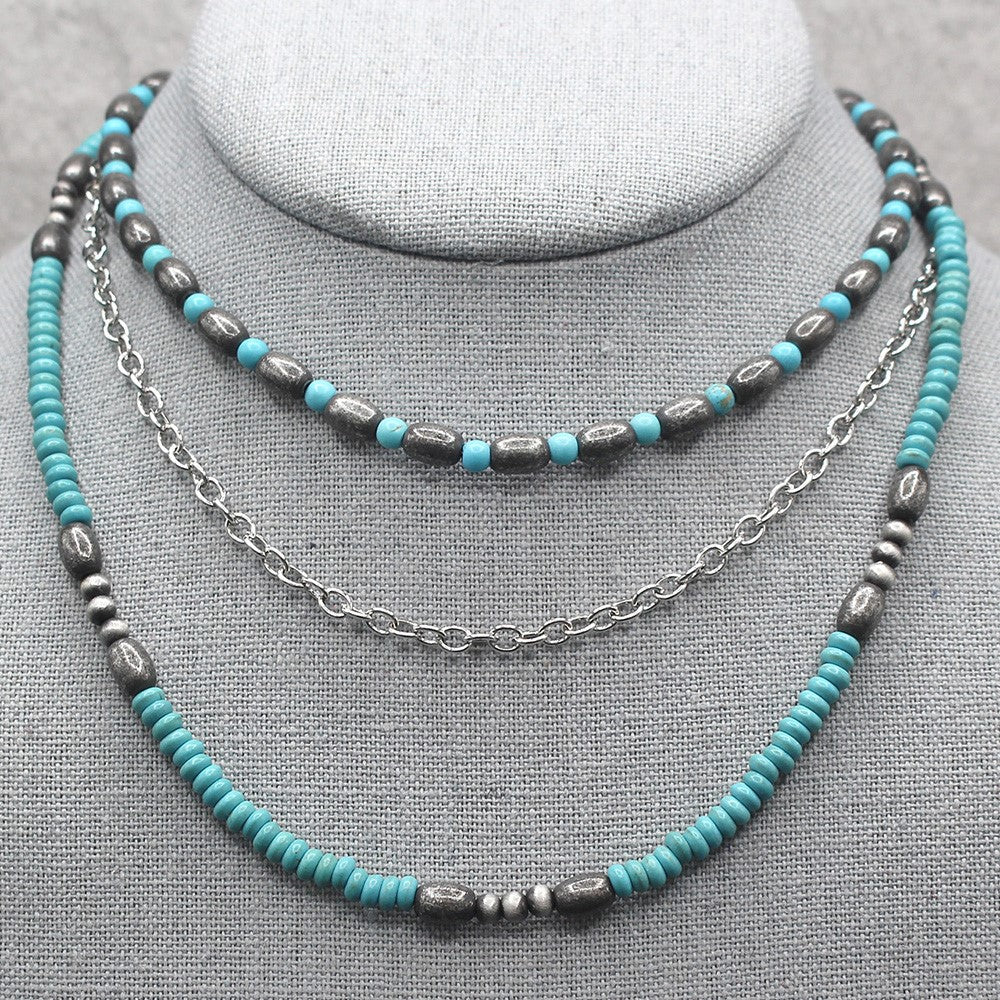 Triple Strand Torpedo Bead Necklace